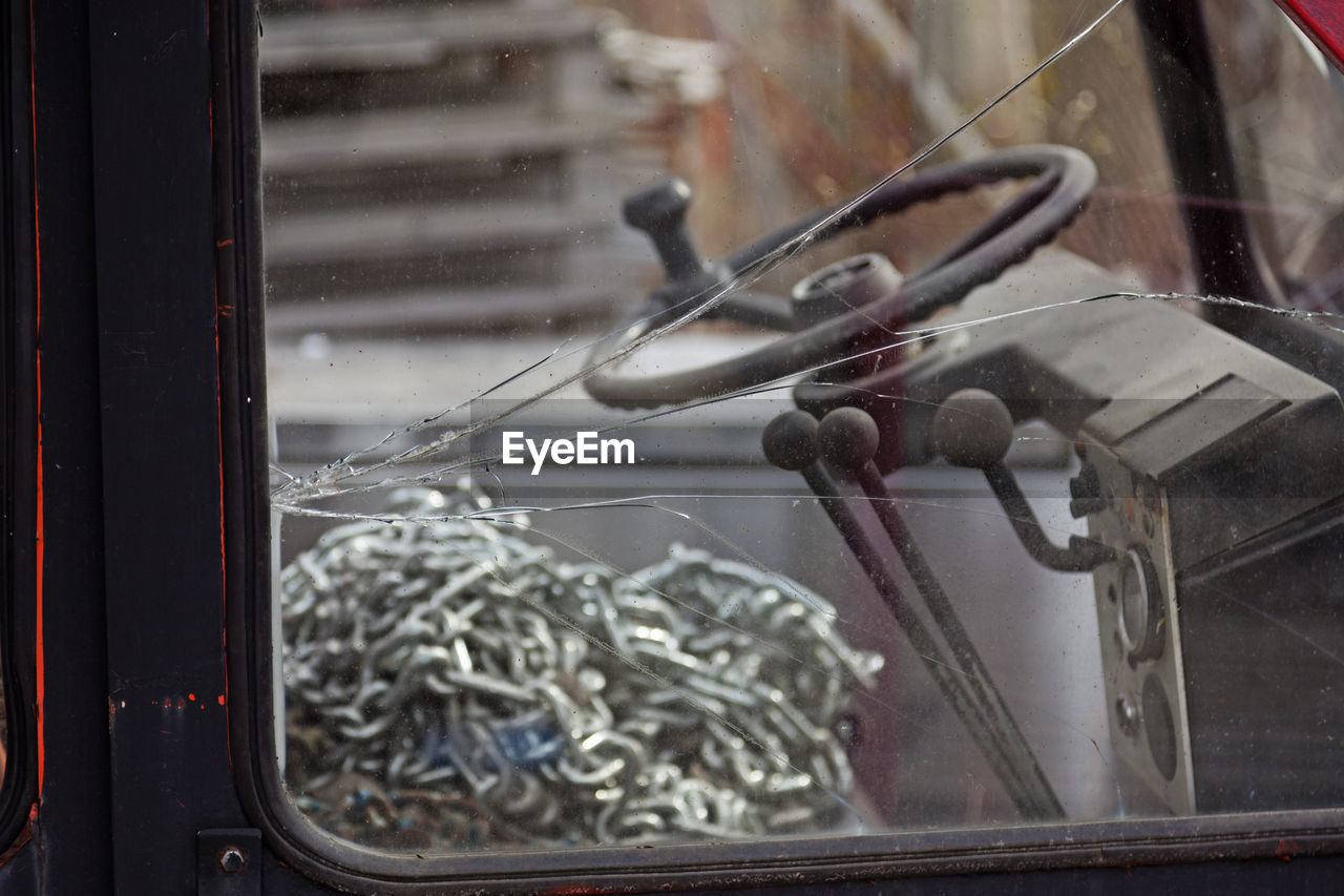 Broken window to a cab for a forklift