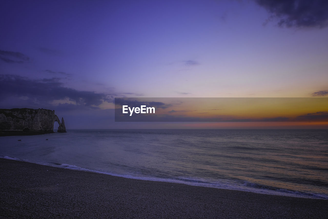 sea, sky, water, beach, land, horizon, beauty in nature, scenics - nature, sunset, ocean, tranquility, dawn, nature, cloud, tranquil scene, horizon over water, evening, wave, coast, idyllic, sand, no people, seascape, shore, body of water, coastline, dramatic sky, outdoors, travel destinations, wind wave, environment, motion, sunlight, landscape, holiday, reflection