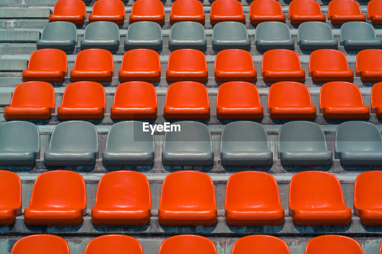 Close-up of seats in row at stadium