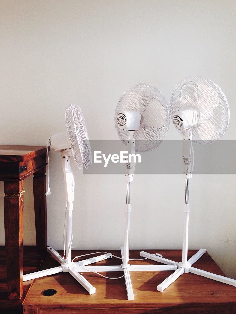 Electric fans in row
