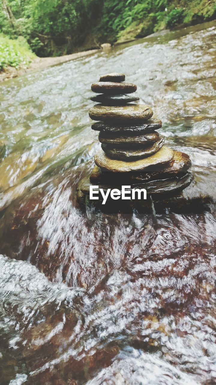 High angle view of stones in river 