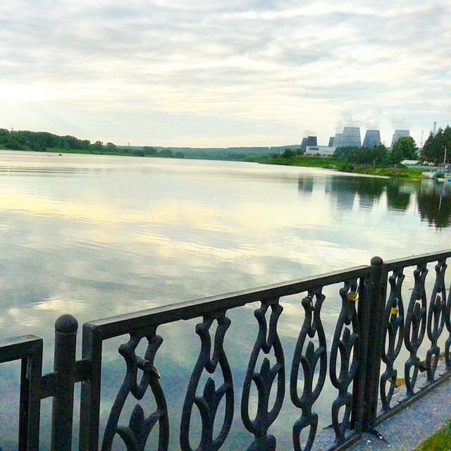 VIEW OF RIVER AGAINST CLOUDY SKY