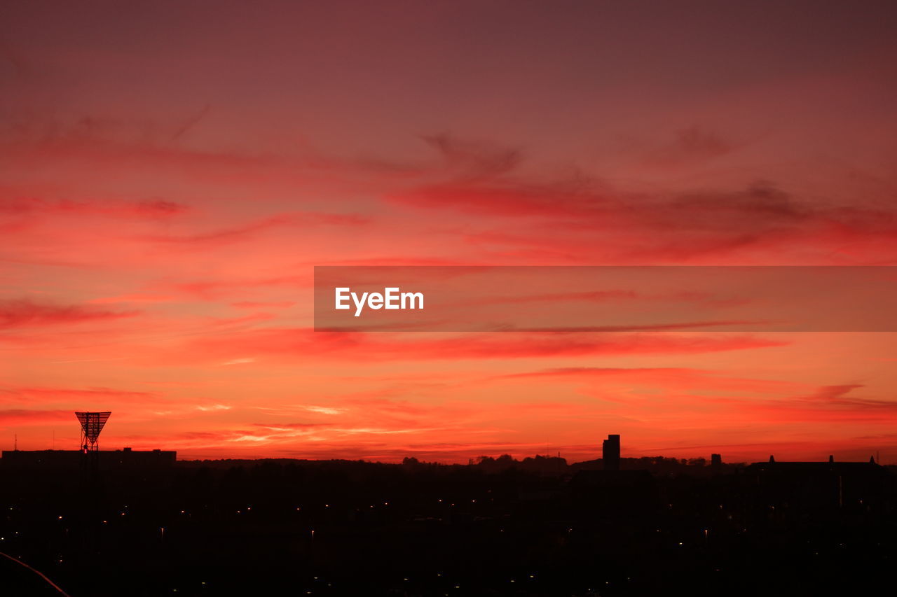 Silhouette of landscape against dramatic sky