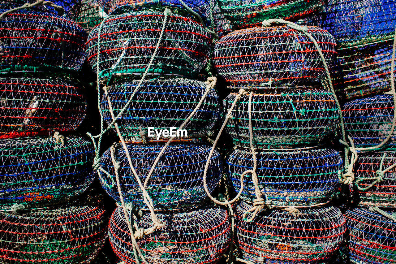 Full frame shot of fish traps stacked outdoors