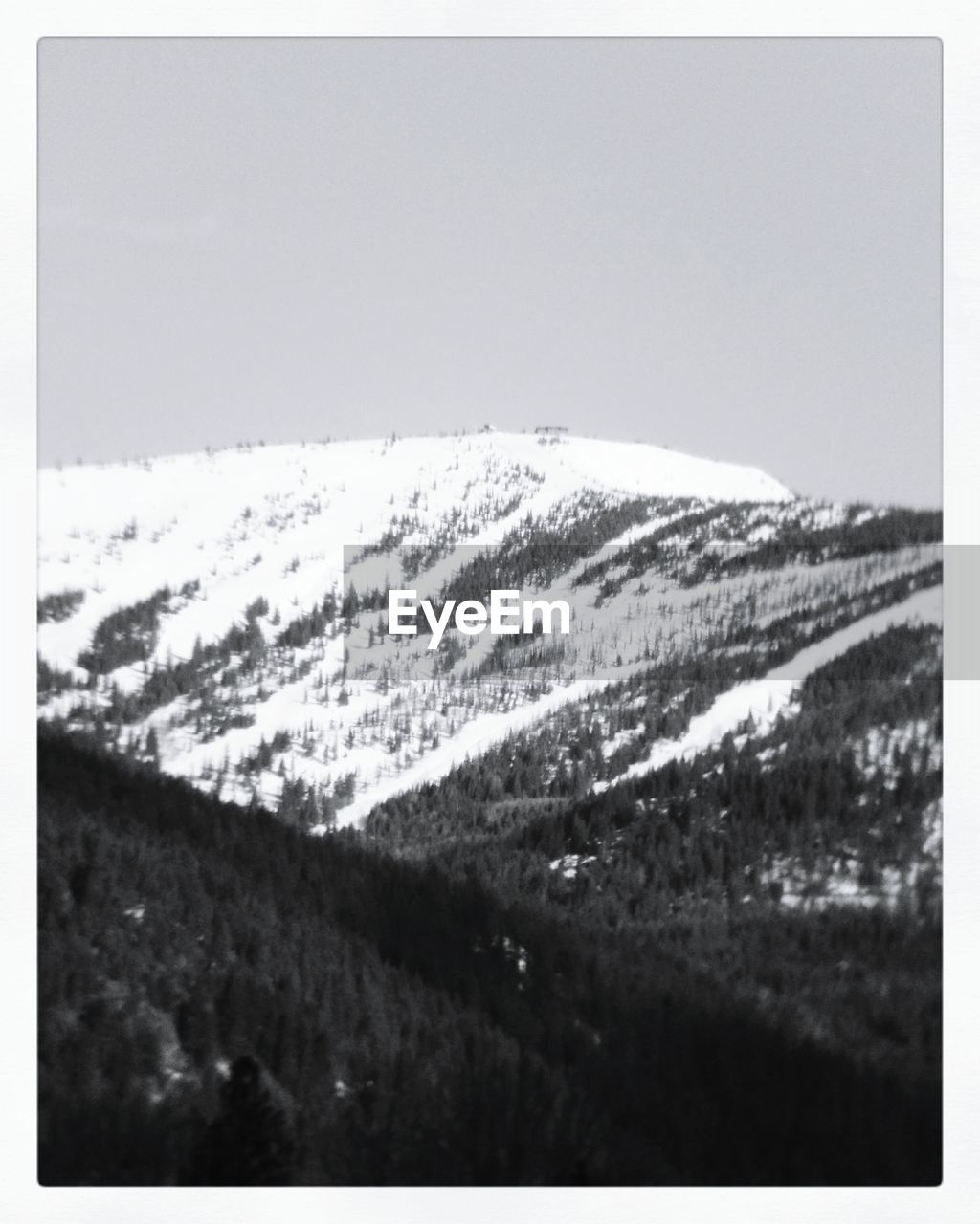 SNOWCAPPED MOUNTAINS AGAINST CLEAR SKY