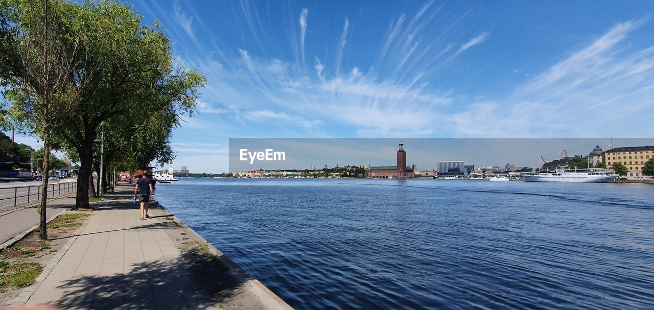 Scenic view of sea against blue sky