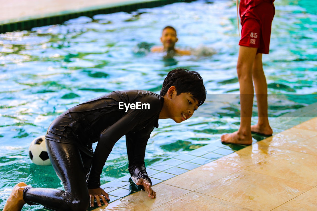 People swimming in pool