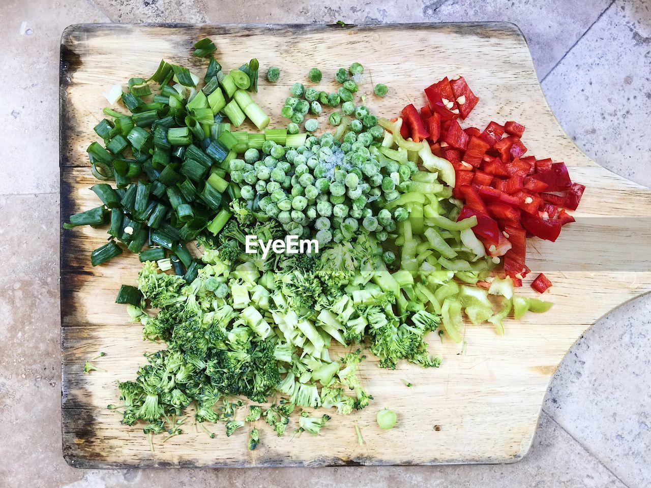 Directly above shot of chopped vegetables on cutting board