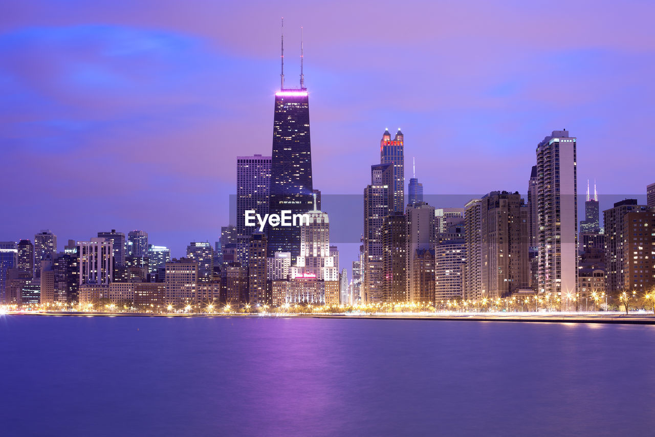 Skyline of downtown chicago at duskin the waterfront of lake michigan, illinois, united states