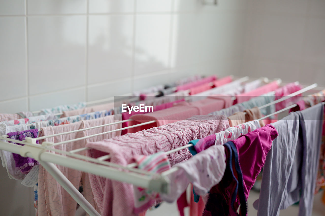 High angle view of clothing drying on rack at home