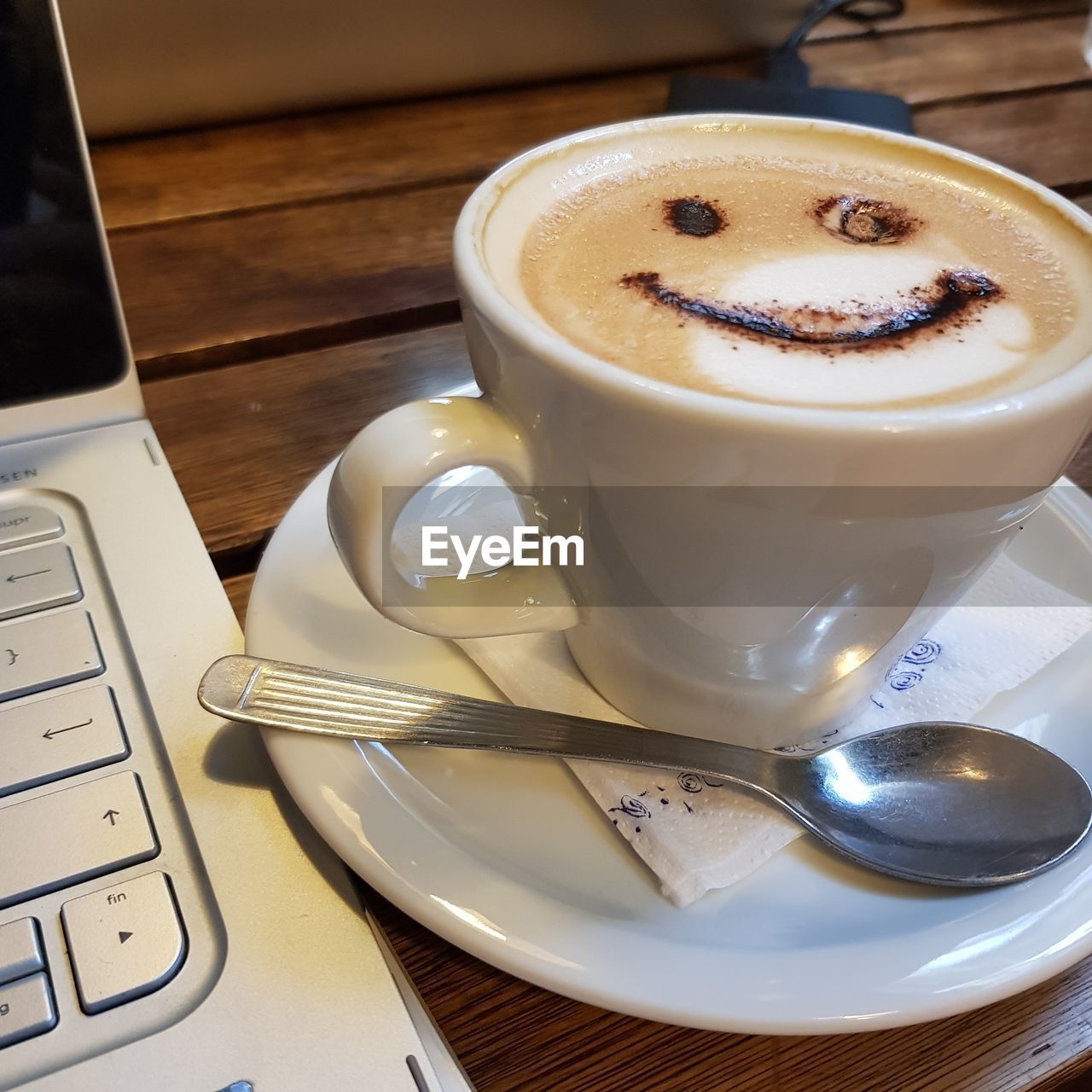 Coffee cup on table