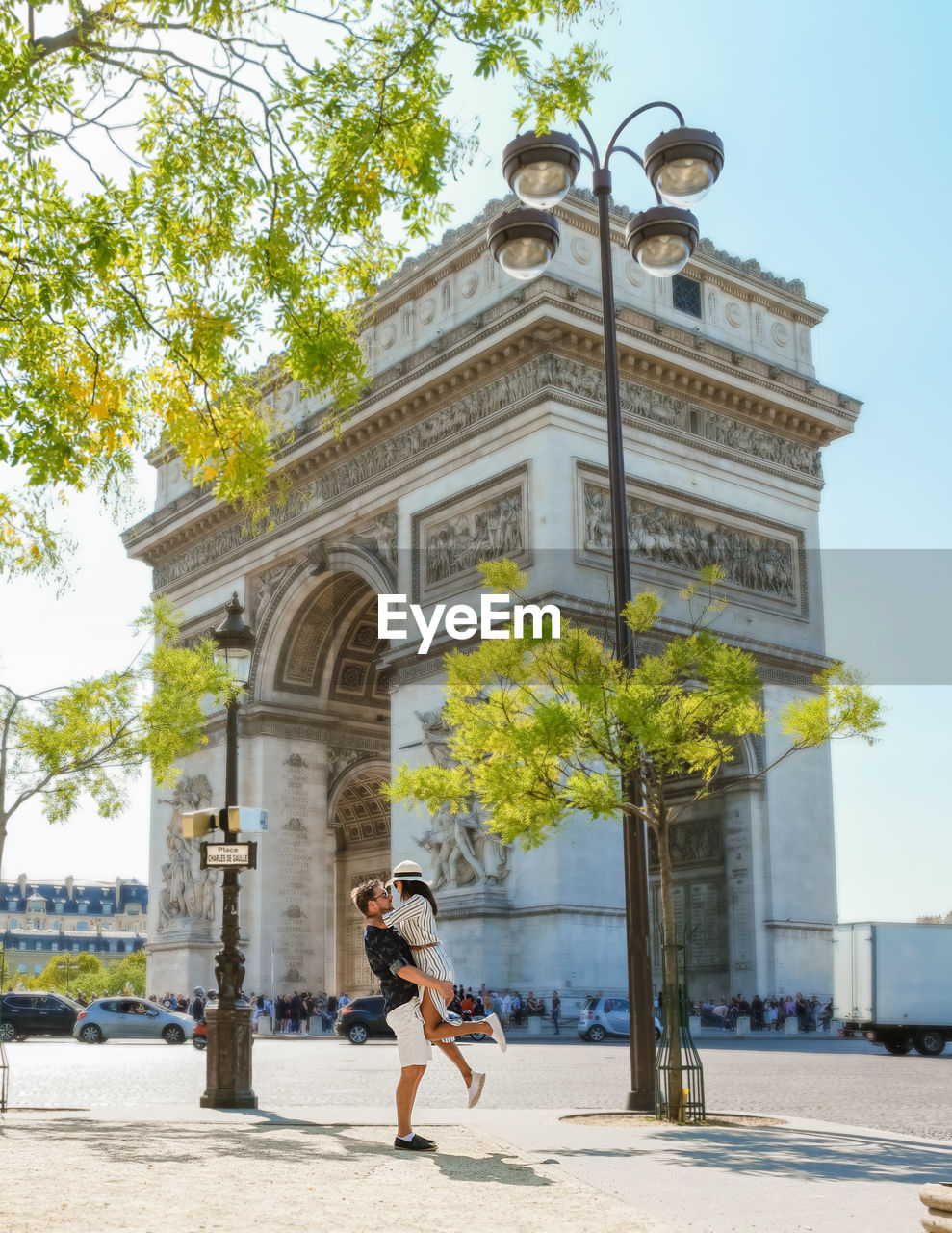 rear view of woman standing outside building