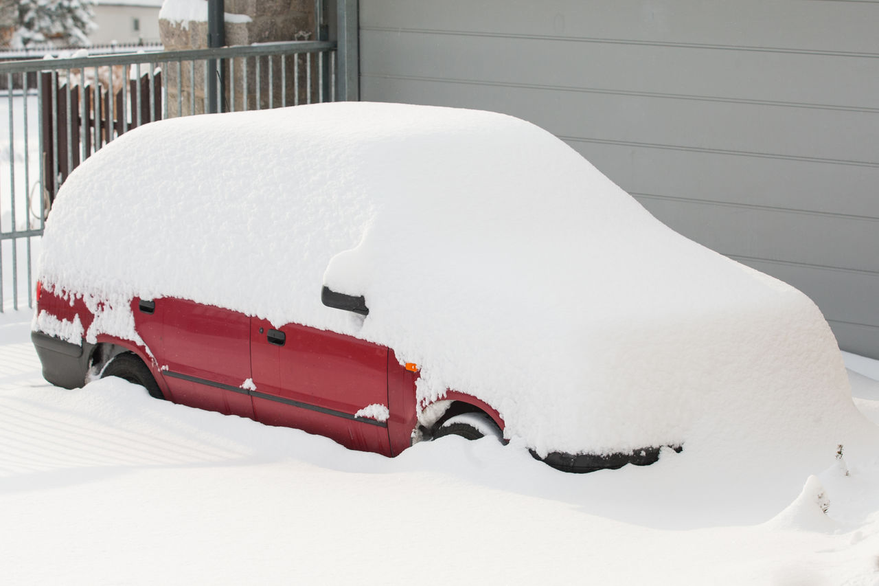 CLOSE-UP OF SNOW COVERED CAR ON ROAD DURING WINTER