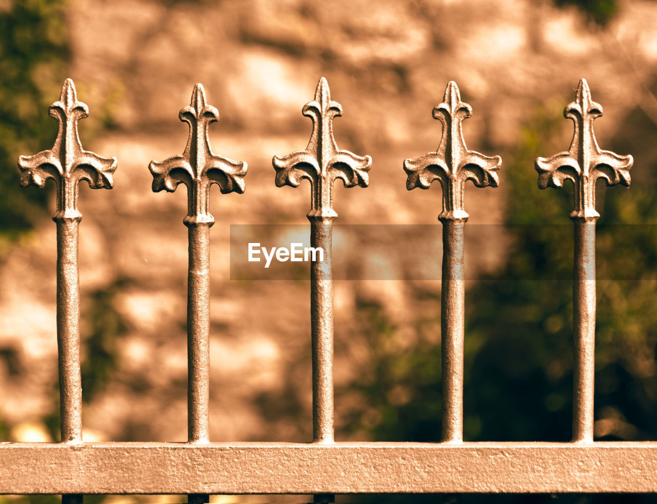 CLOSE-UP OF RUSTY METAL FENCE