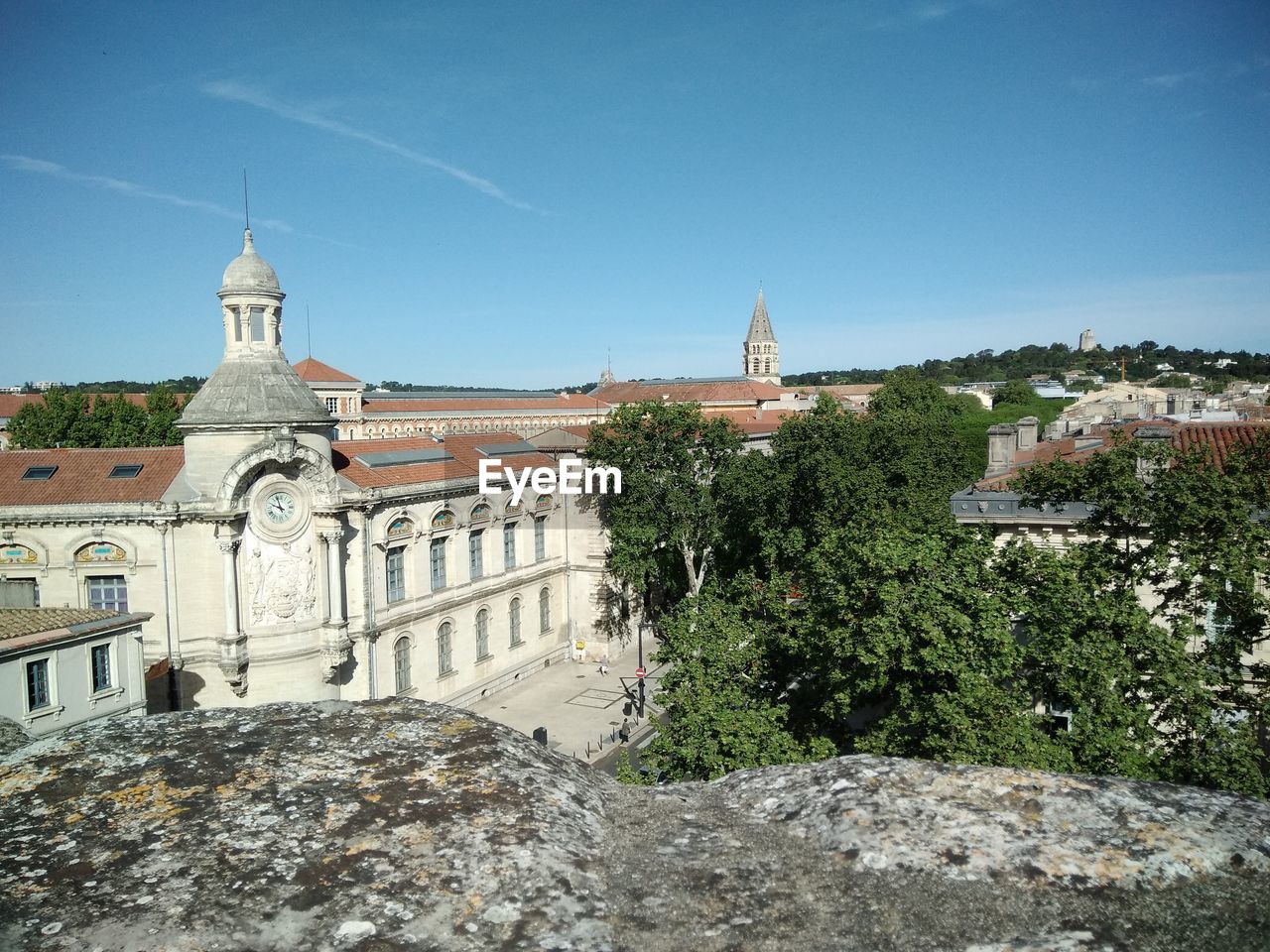 PANORAMIC VIEW OF TEMPLE AND BUILDINGS AGAINST SKY