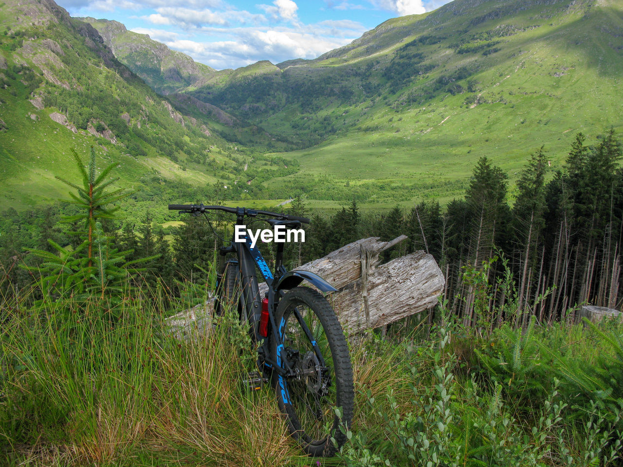 BICYCLE PARKED ON LAND