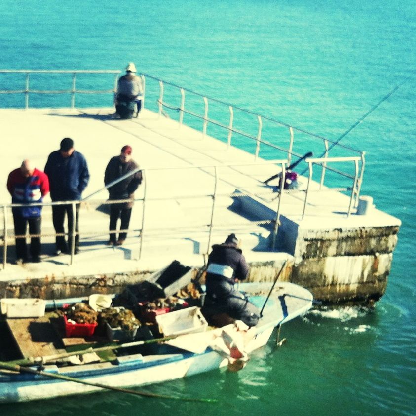 High angle view of people at harbor