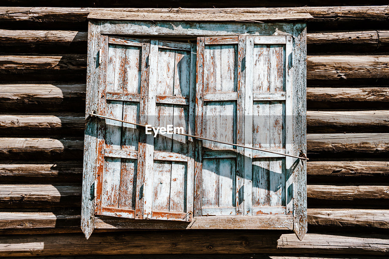 wood, architecture, wall, built structure, no people, building exterior, building, day, iron, house, old, window, weathered, closed, door, outdoors, lumber, entrance, blue, wall - building feature, pattern, hut, residential district