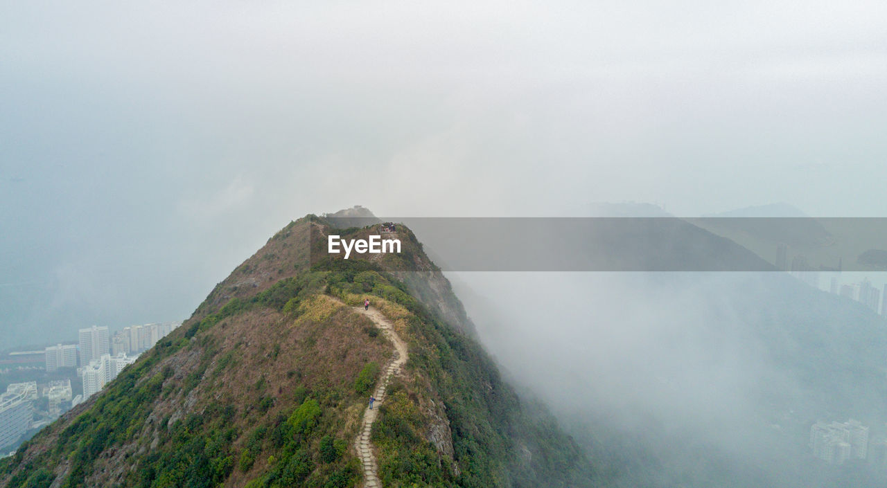 Scenic view of mountains against sky during winter
