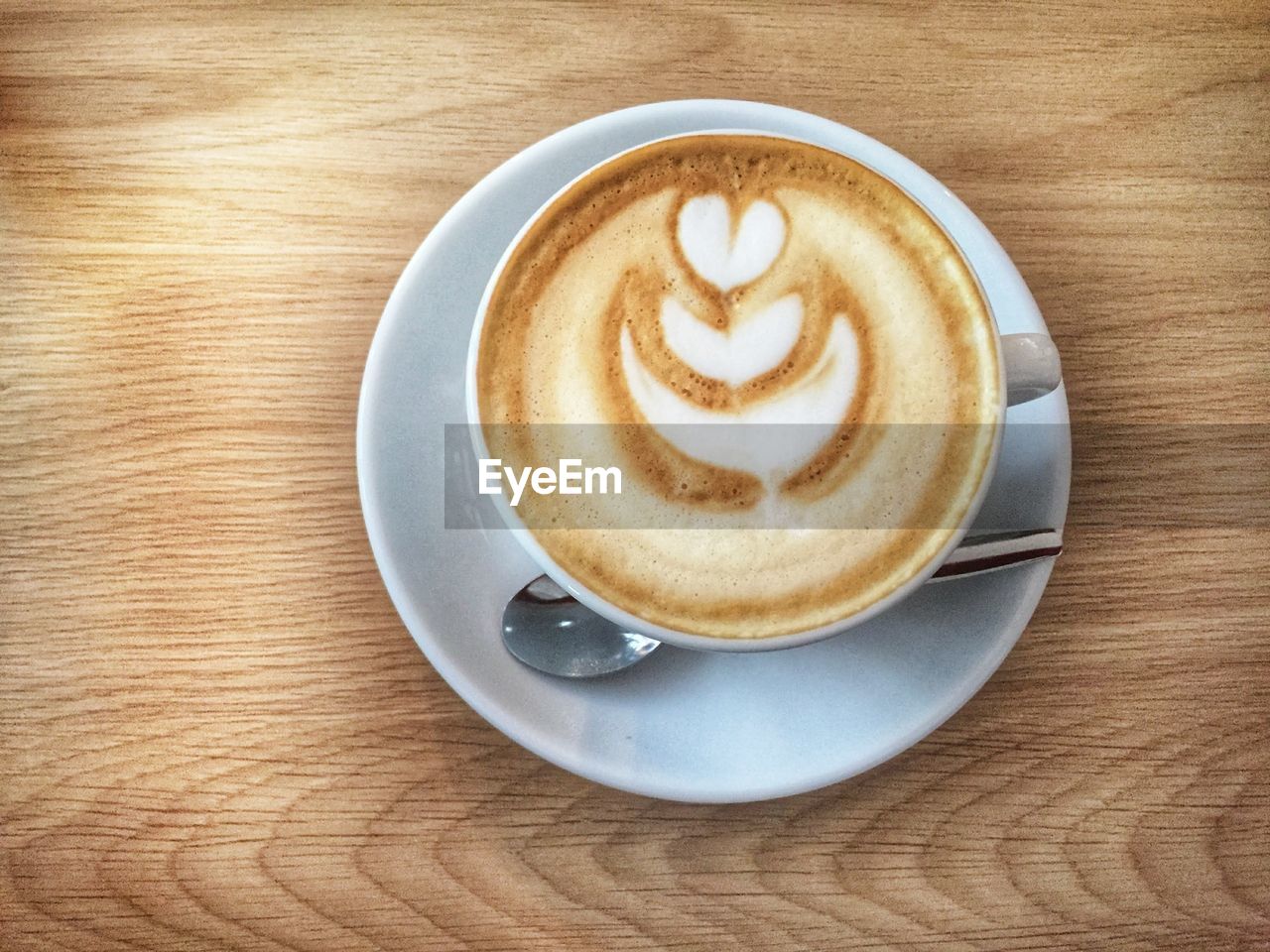 High angle view of cappuccino on table