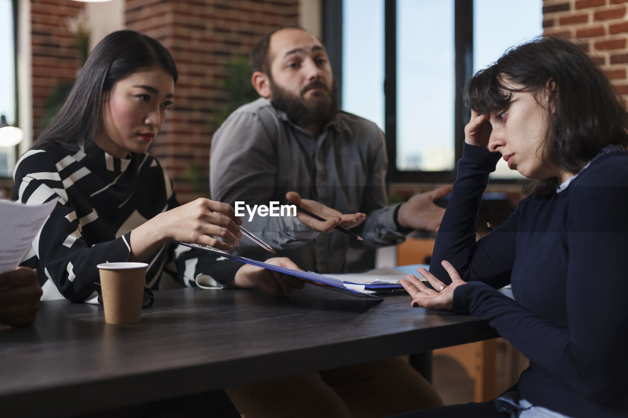 Business people taking interview in office