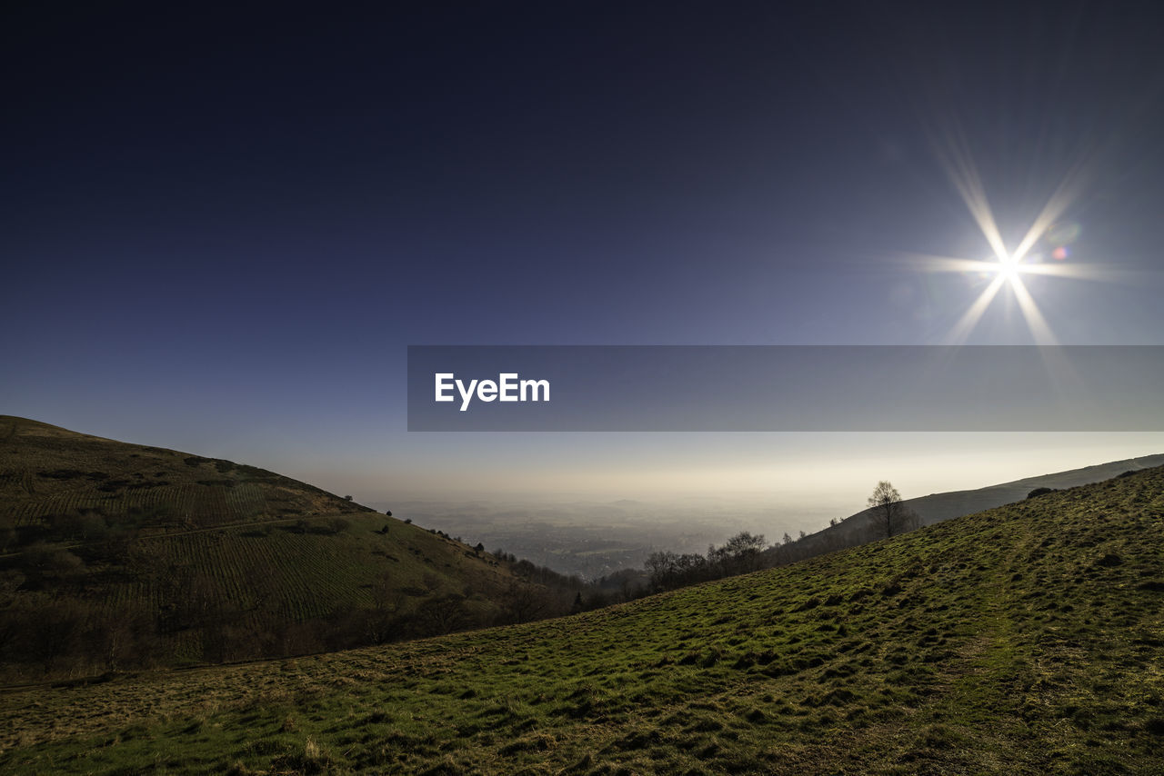 Scenic view of mountains against clear sky