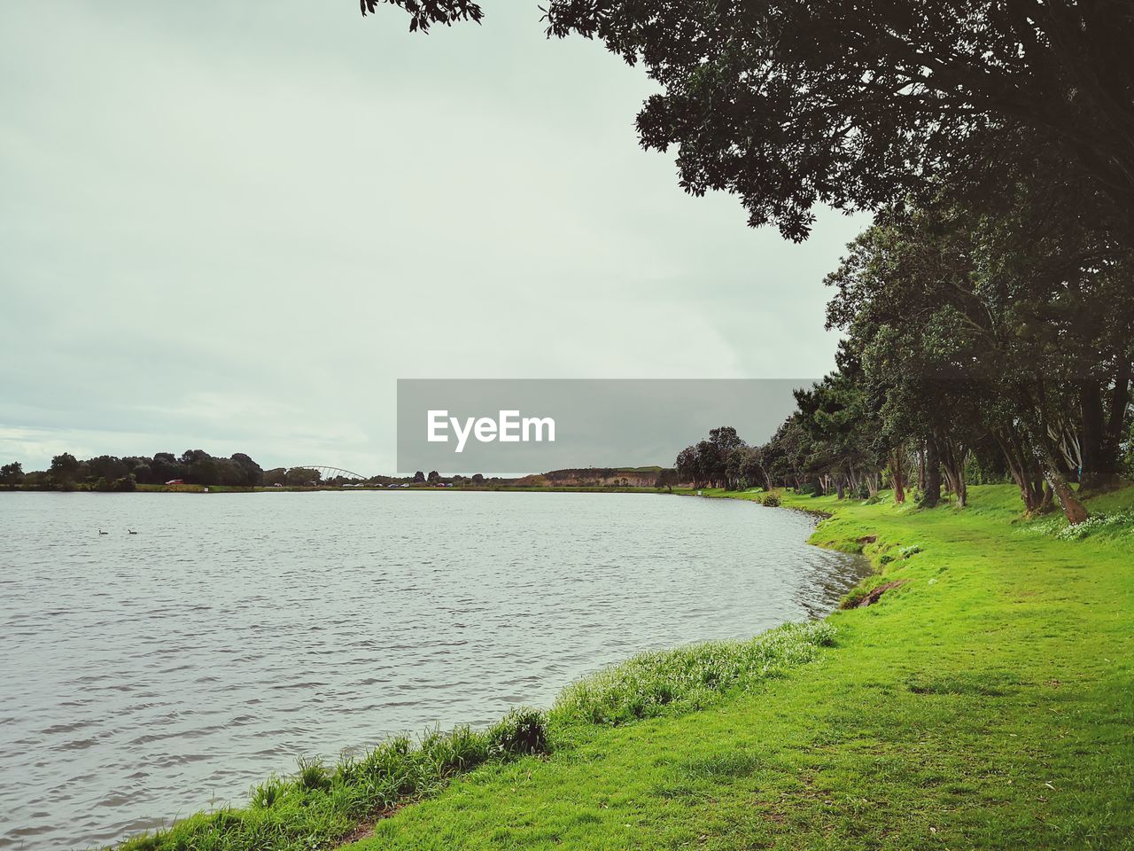 VIEW OF LAKE AGAINST SKY