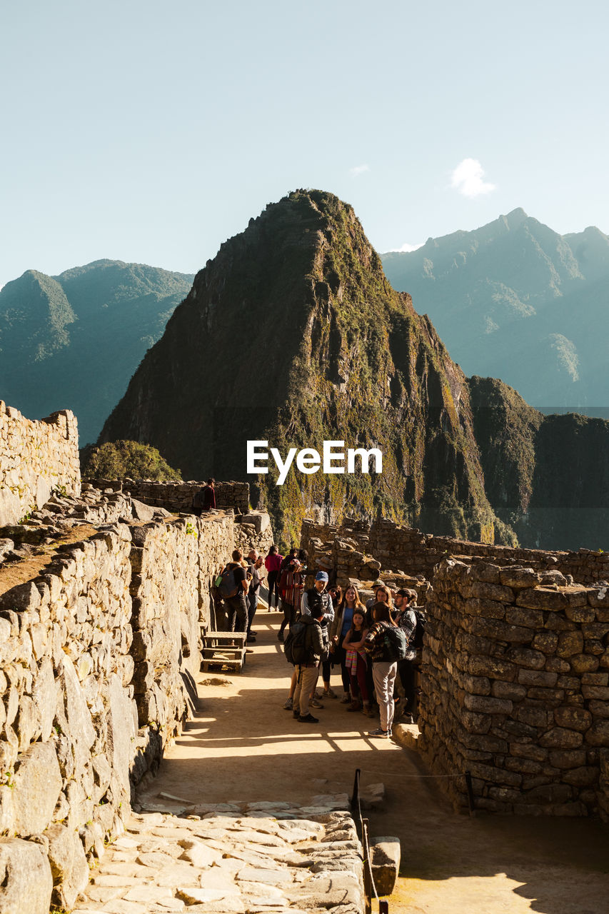 Machu picchu old inca ruins at sunrise in peru