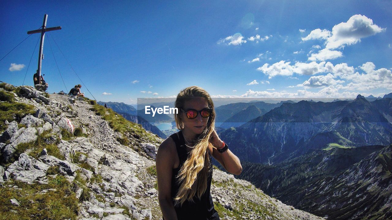 Portrat of woman with mountains in background