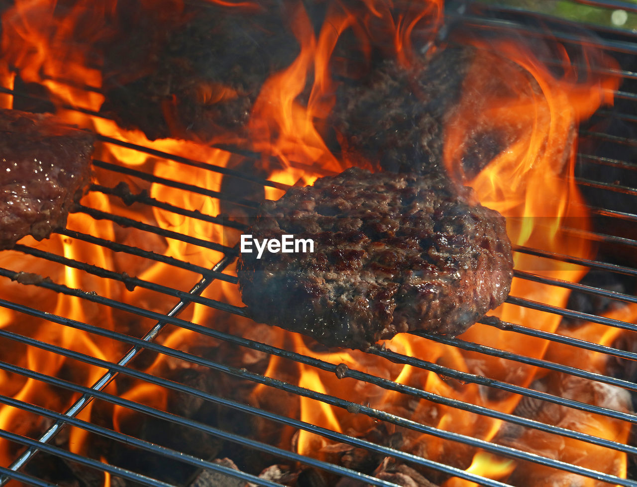 Close-up of meat on barbecue grill