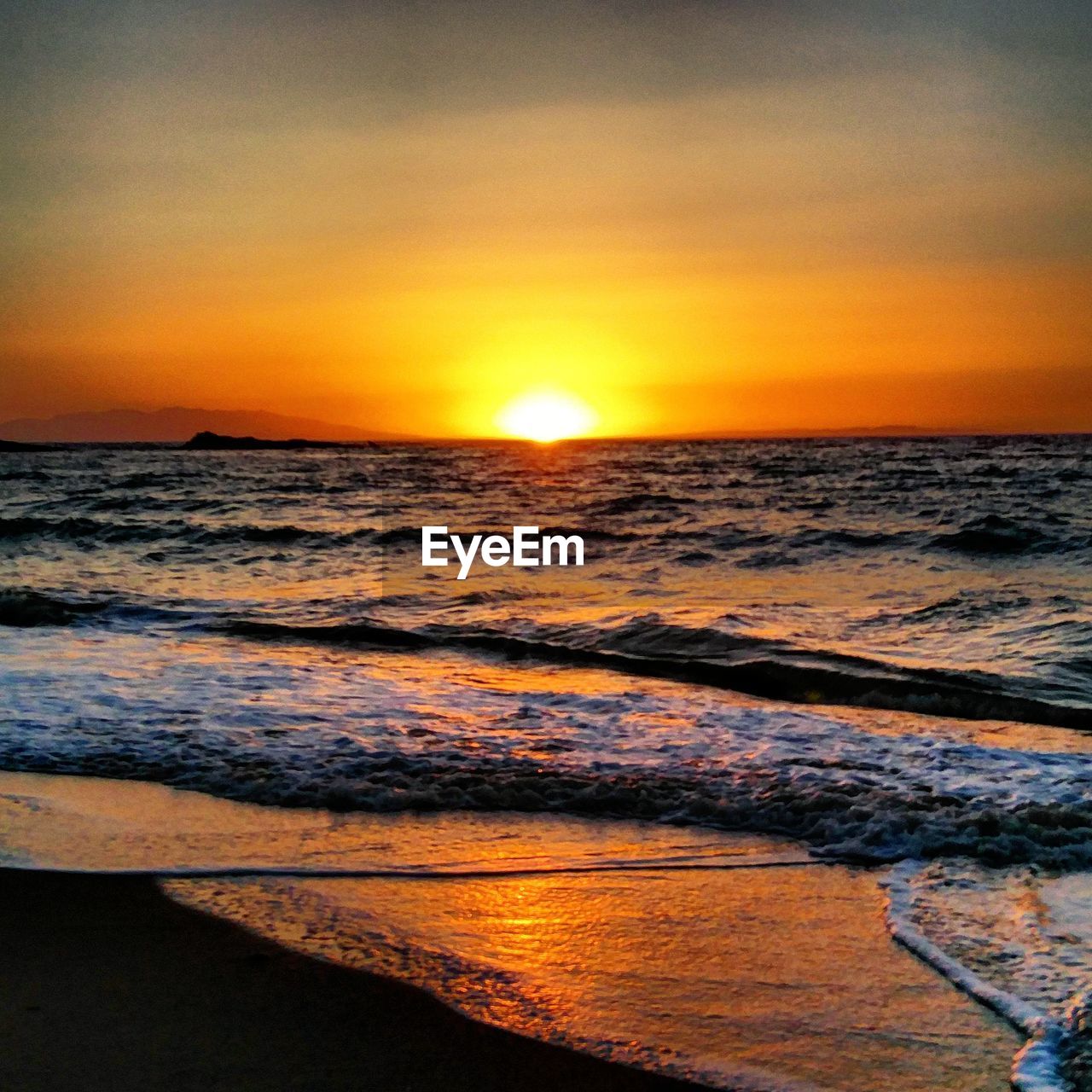 SCENIC VIEW OF SEA DURING SUNSET
