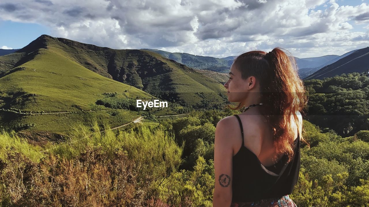 Young woman looking at mountains