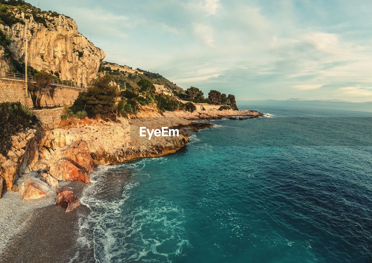 SCENIC VIEW OF SEA AND ROCKS