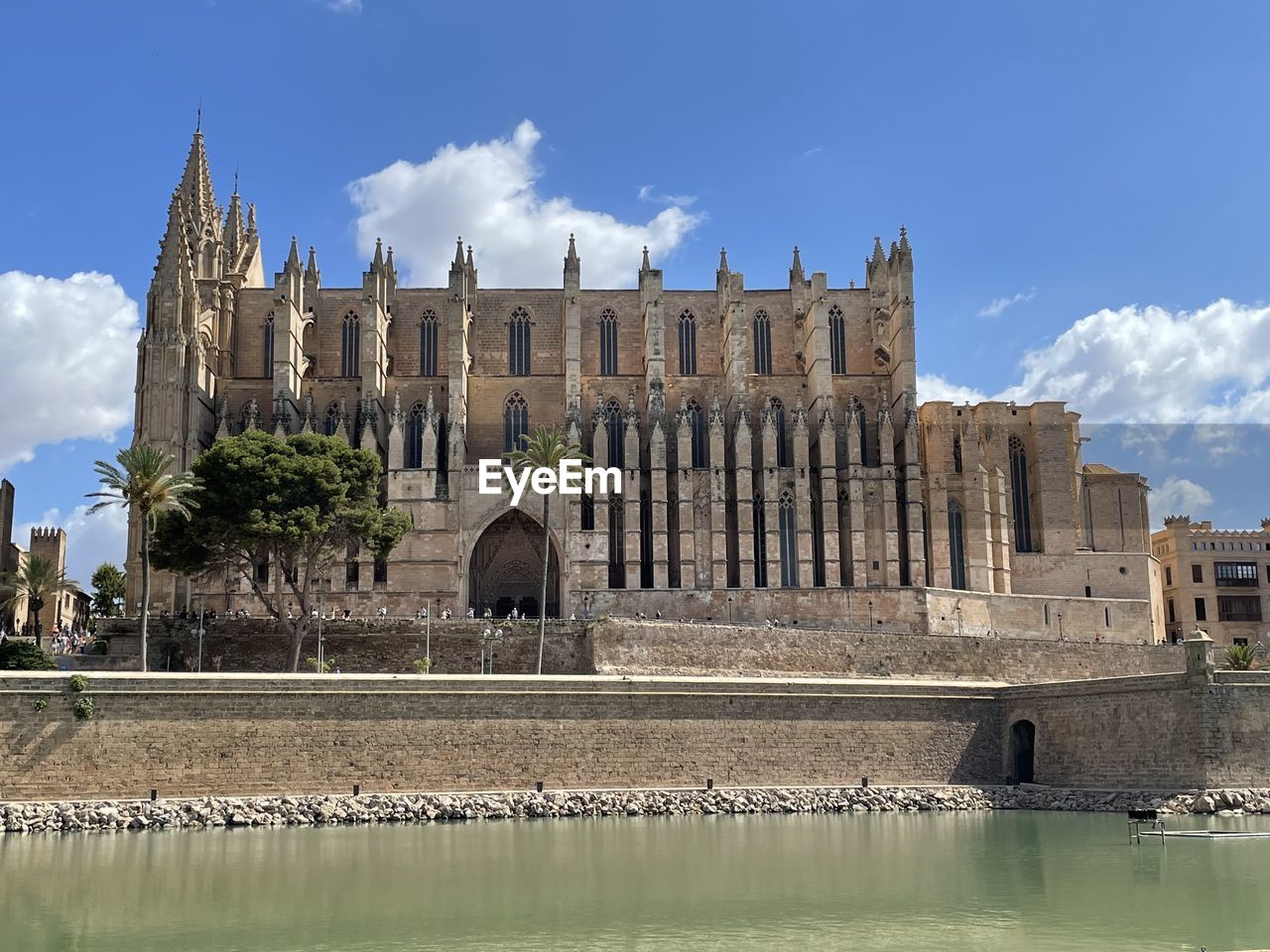 reflection, architecture, sky, built structure, water, nature, landmark, cloud, building exterior, day, no people, travel destinations, blue, travel, outdoors, history, the past, building, tourism, city