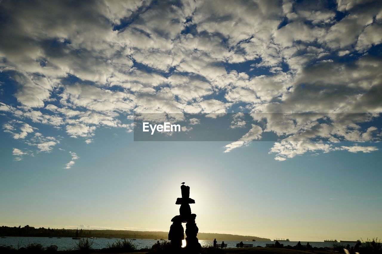 Inukshuk stone sculpture at english bay