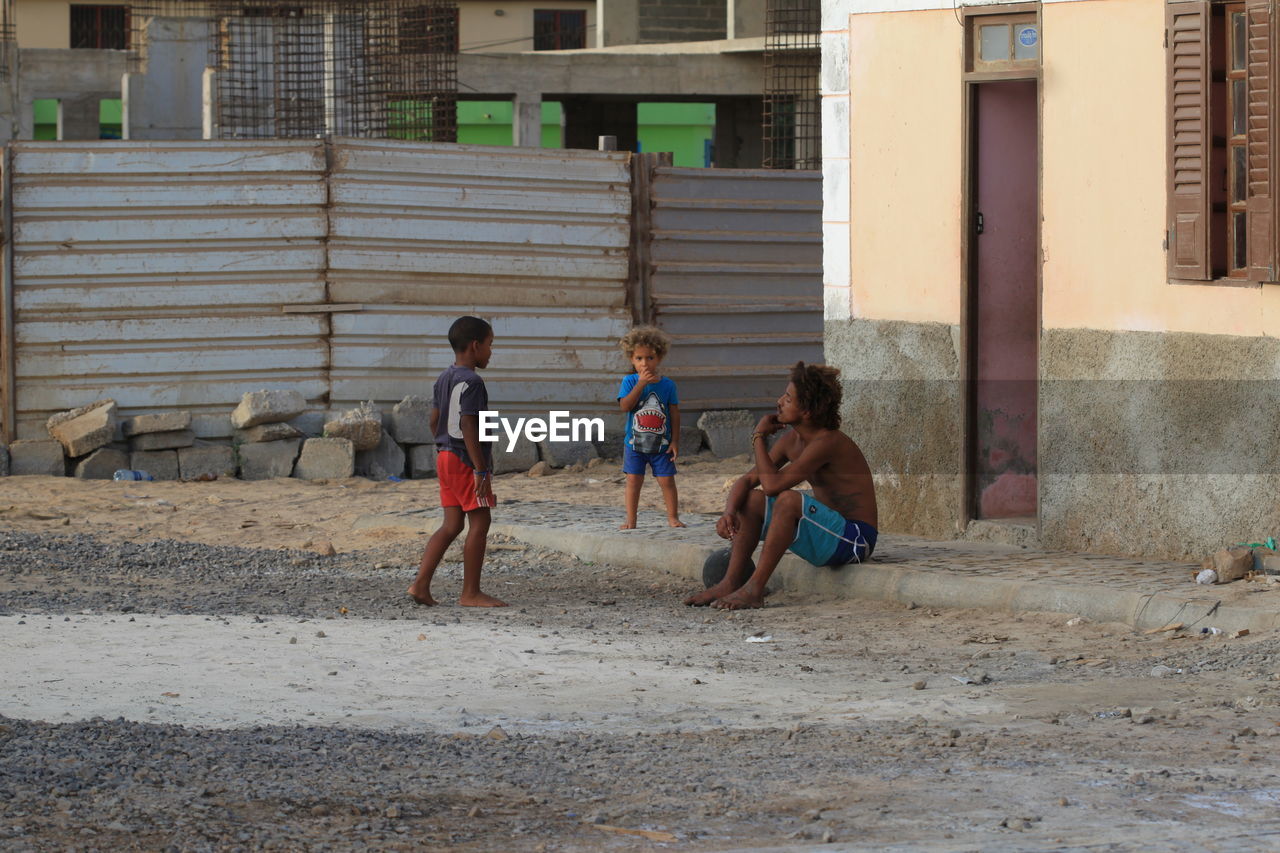 CHILDREN PLAYING AT FARM