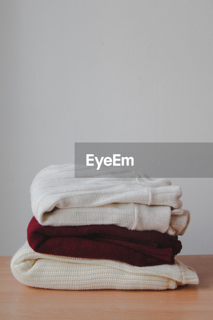 close-up of towels on table against gray background