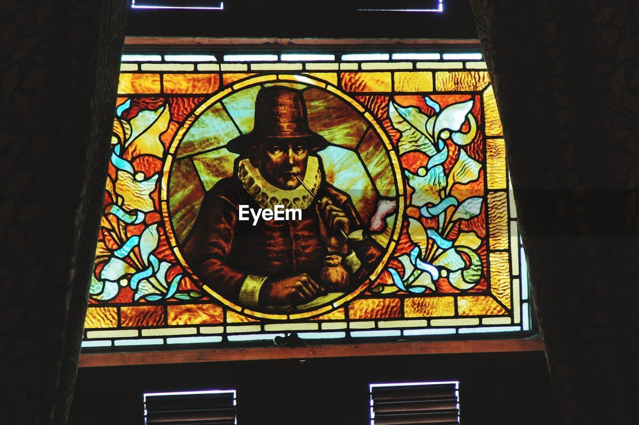 MULTI COLORED GLASS WINDOW OF BUILDING