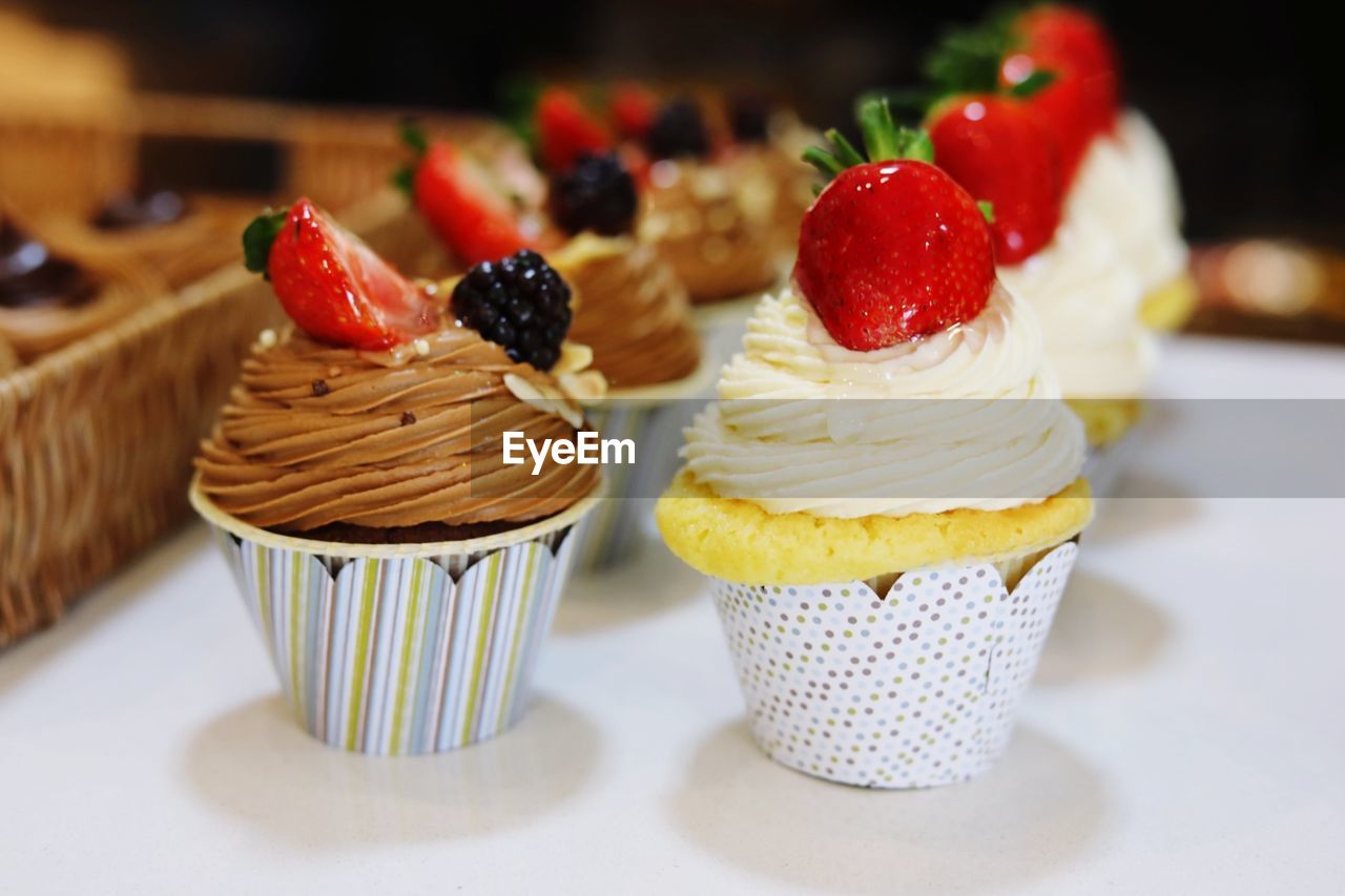 Close-up of cupcakes on table