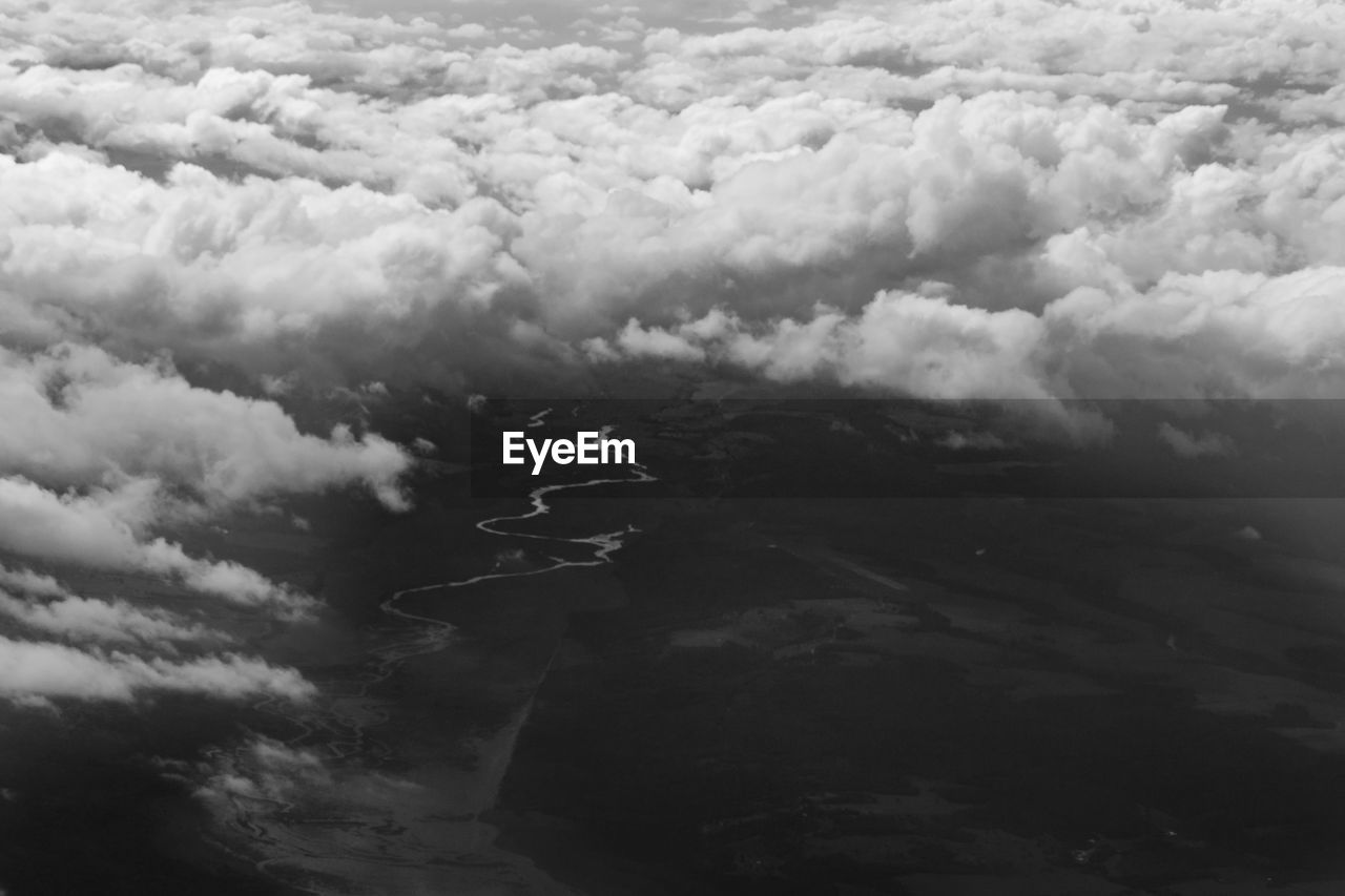 Aerial view of river and
 cloudscape
