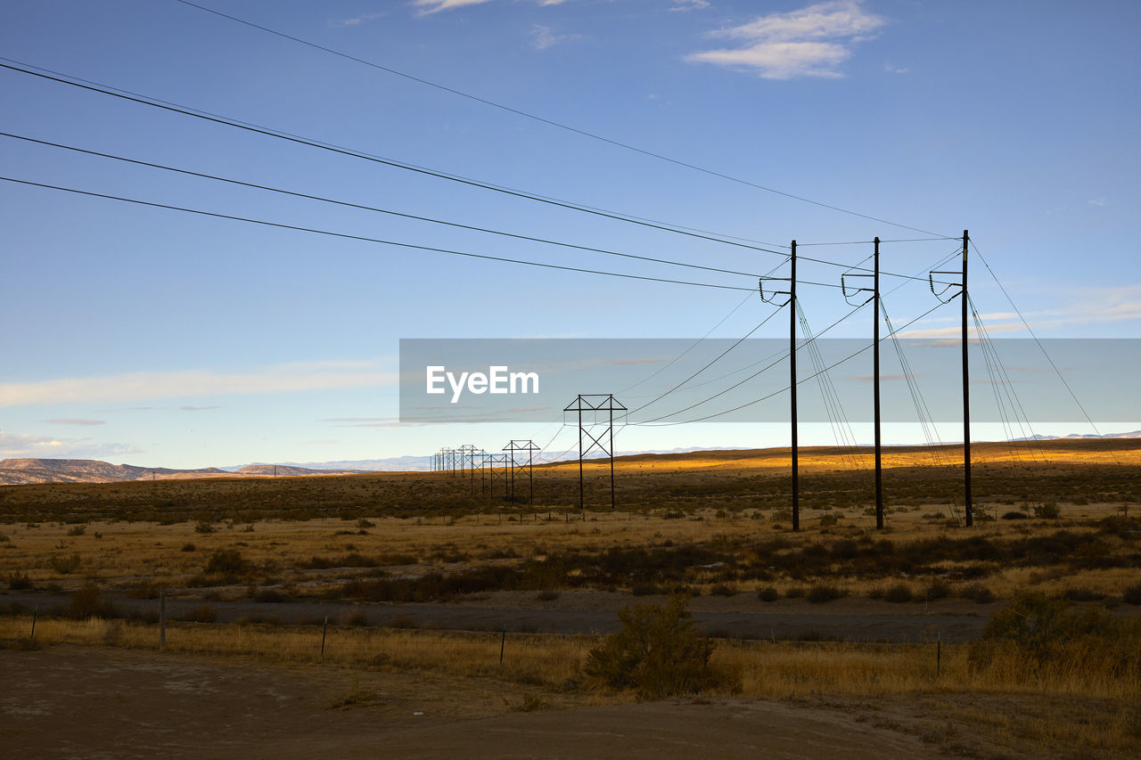 Power lines over the desert in fruita, colorado.