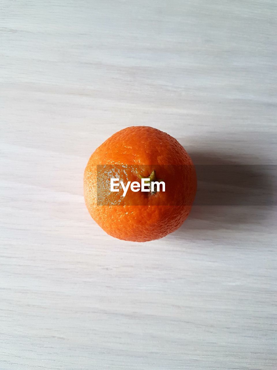 Close-up of orange fruit on table