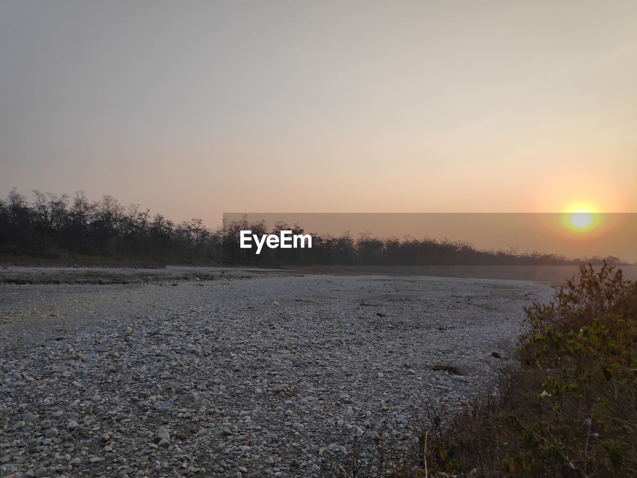 SCENIC VIEW OF LAND DURING SUNSET