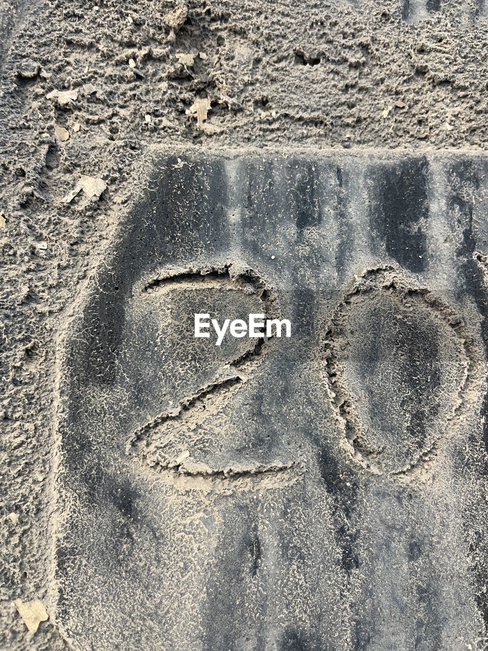 sand, land, beach, rock, day, no people, nature, heart shape, high angle view, creativity, soil, footprint, sunlight, print, positive emotion, love, track - imprint, geology, outdoors, draw, ancient history, close-up, pattern, road surface, drawing, textured