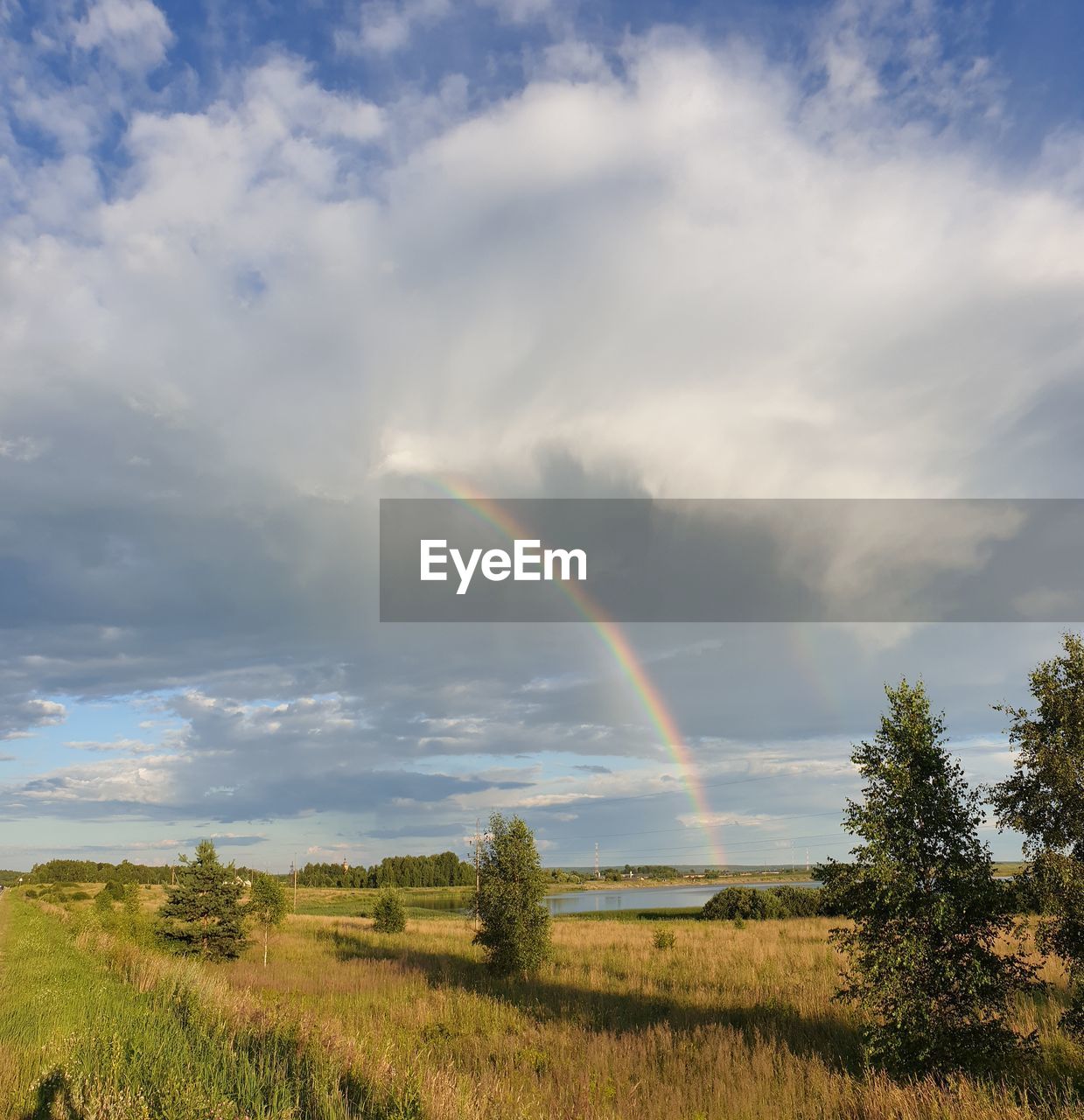 SCENIC VIEW OF RAINBOW AGAINST SKY