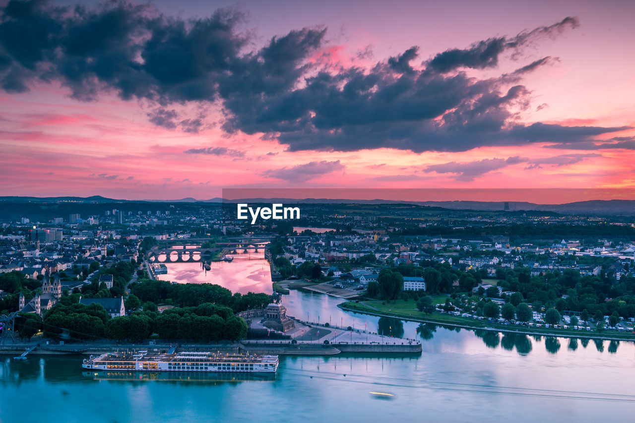 Aerial view of city against cloudy sky at sunset, deutsches eck, festung ehrenbreitstein