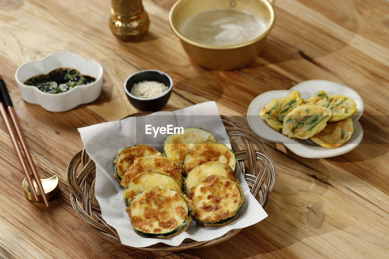 Hobak jeon or pan fried zucchini, traditional korean vegetable pancake 