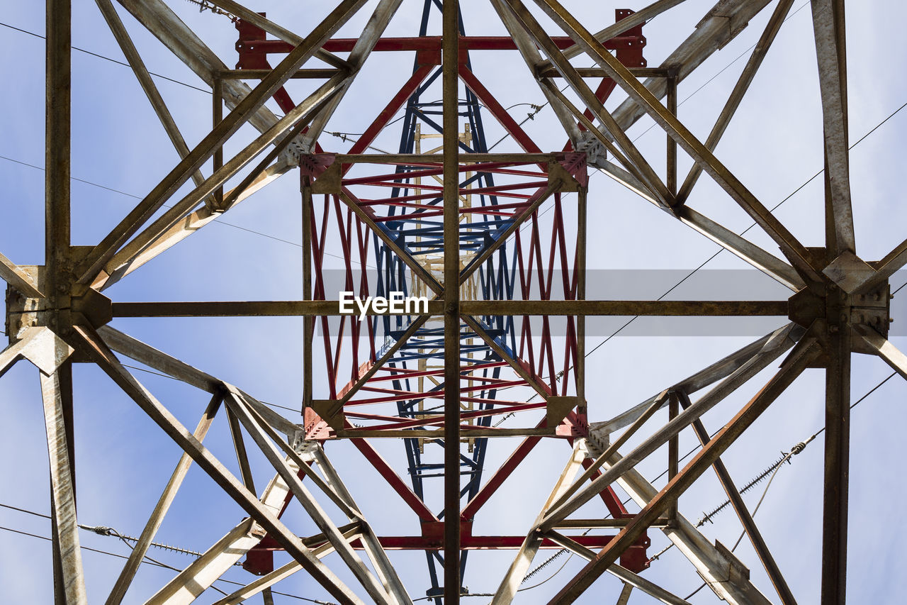 Low angle view of high voltage electric pylon 