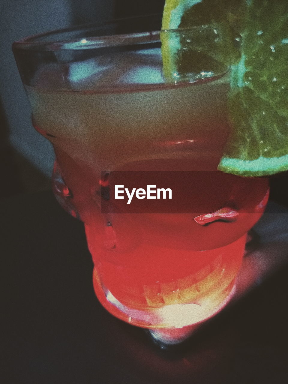 CLOSE-UP OF DRINK IN WINEGLASS