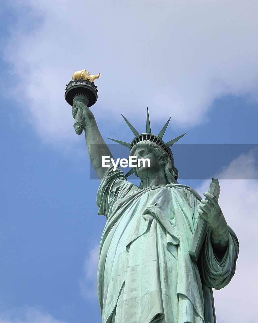 Low angle view of statue against sky